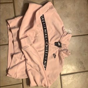 Nike Air Women’s 1/2- zip top in Echo Pink